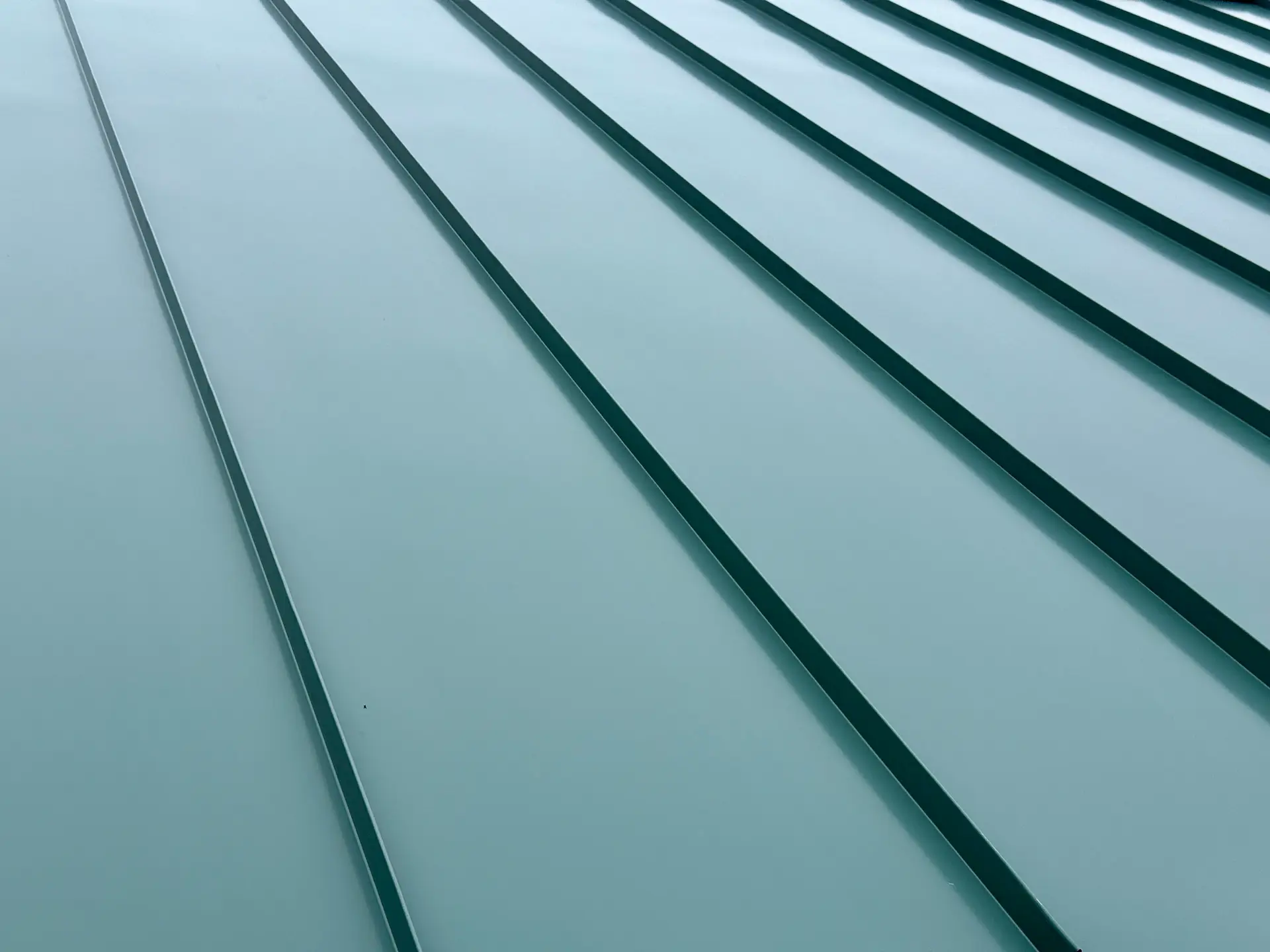 Close-up of premium standing seam metal roof installation